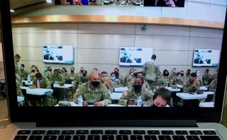 Bonnie Hauser speaks to a US Army unit as part of their educational series on extremism