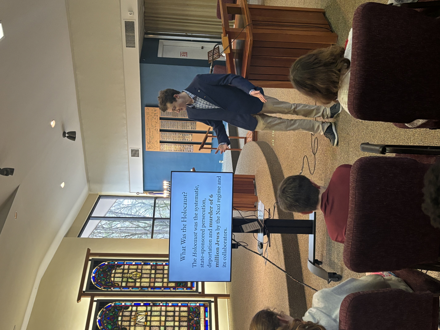 Graham Drake delivering a talk to Sunday School students at the Kehillah Synagogue in Chapel Hill